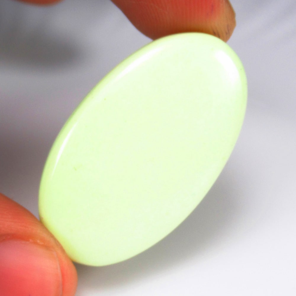 38.83 Ct - Natural Lemon Chrysoprase: No Reserve! Title: 38.83 Ct - Natural Lemon Chrysoprase Additional Information: Gemstone Gemstones: Chrysoprase Carat Weights: 38.83 Size/Dimensions: 40.0 x 21.0 x 5.0 mm Additional Information: Piece