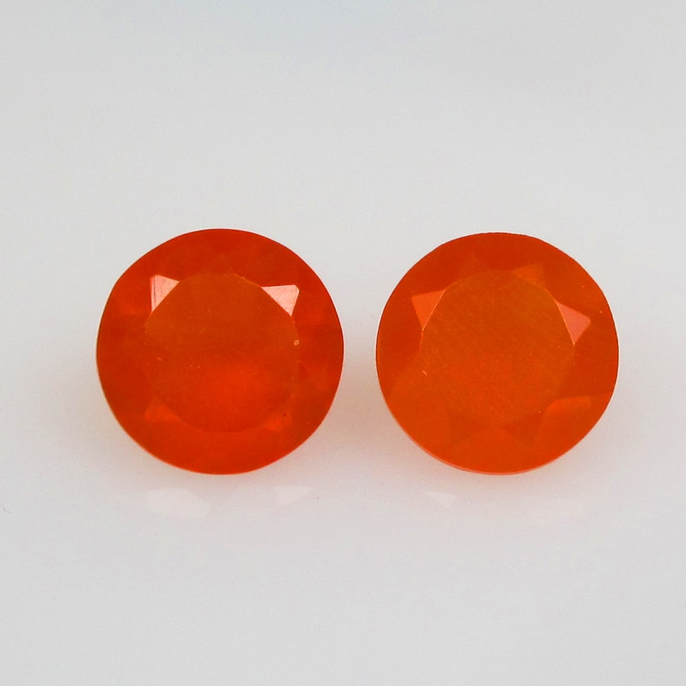 2.19 Ctw Natural Carnelian Round Pair: No Reserve! Title: 2.19 Ctw Natural Carnelian Round Pair Stone Clarity: Semi-Transparent Gemstones: Natural Carnelian Carat Weights: 2.19 Size/Dimensions: 7.00 x 7.00 x 4.40 mm / 2 Pc's Additional Inf