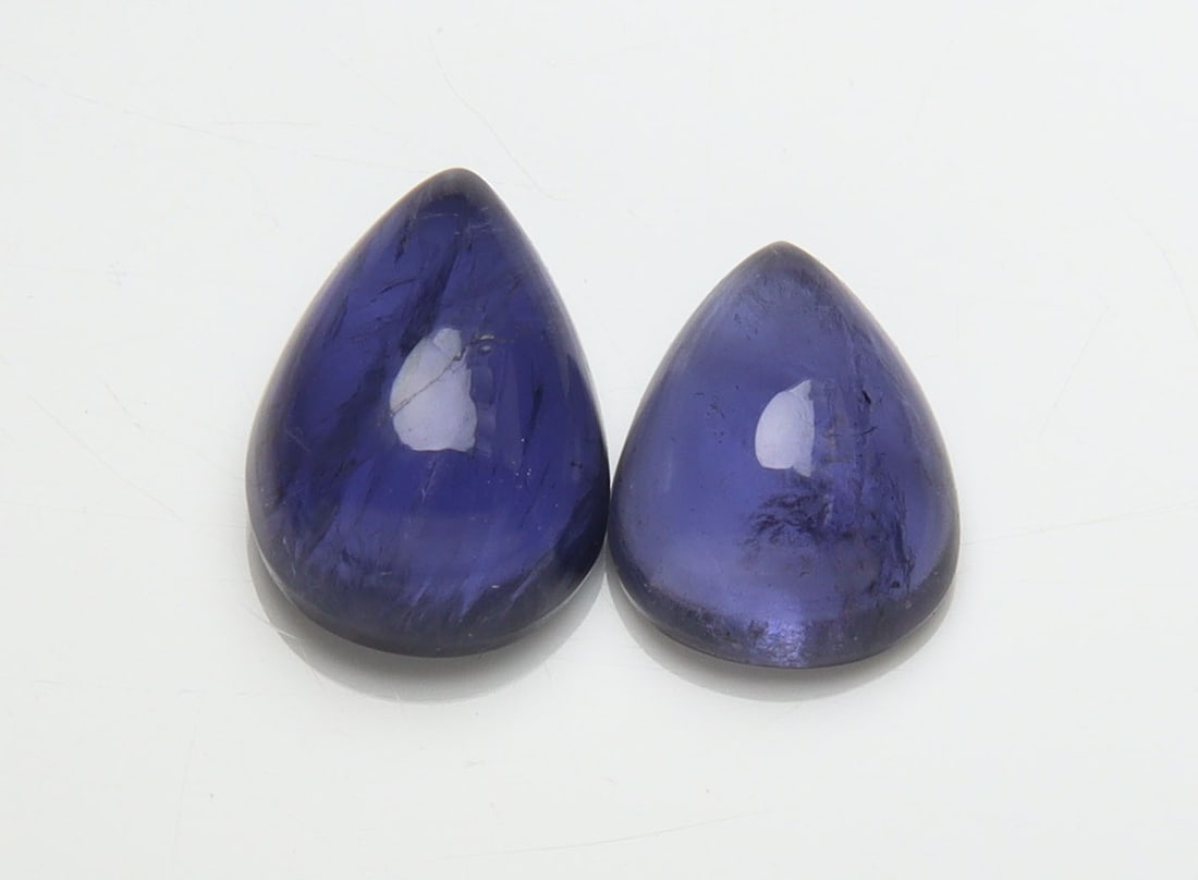 Awesome " Natural Iolite Violet " 4.38 Cts Natural Iolite Lot: No Reserve! Title: Awesome " Natural Iolite Violet " 4.38 Cts Natural Iolite Lot Provenance/Additional Info: Gemstone : Natural Iolite. Shape and Cut : Pear Cabochon. Weight : 4.38 Carats. Measurement