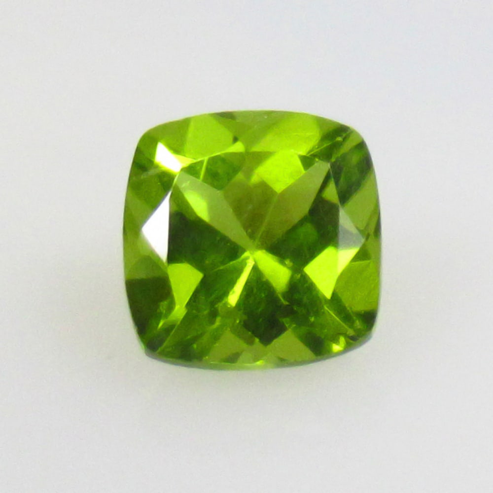 1.71 Ctw Natural Pakistan Peridot Cushion Cut: No Reserve! Title: 1.71 Ctw Natural Pakistan Peridot Cushion Cut Stone Clarity: VVS Gemstones: Natural Peridot Carat Weights: 1.71 Size/Dimensions: 7.00 x 7.00 x 5.00 mm Additional Information: Top Cl