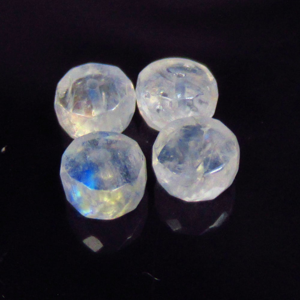 6.61 Ctw Natural 4 Blue Moonstone Round Beads: No Reserve! Title: 6.61 Ctw Natural 4 Blue Moonstone Round Beads Stone Clarity: Translucent Gemstones: Natural Moonstone Beads Carat Weights: 6.61 Size/Dimensions: 6.60 - 7.10 mm / 4 Pc's Additional I
