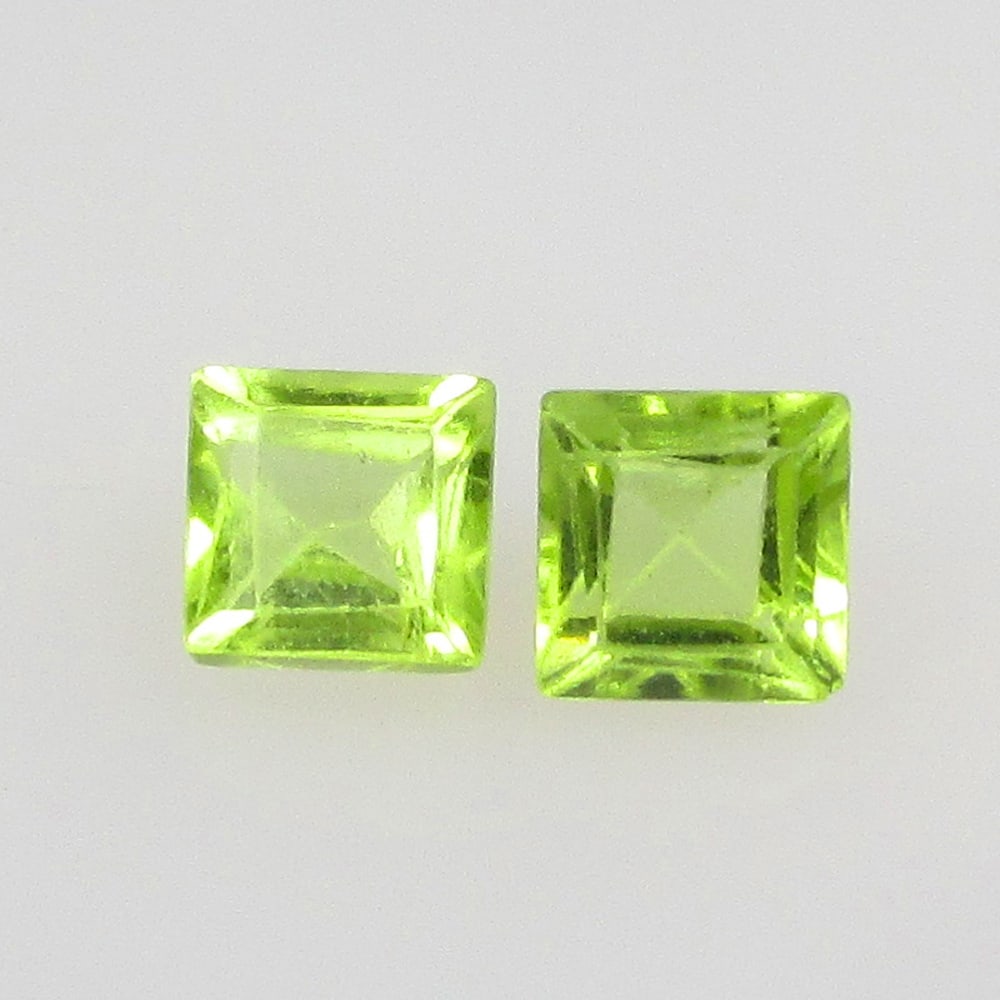 0.95 Ctw Natural Pakistan Peridot Square Pair: No Reserve! Title: 0.95 Ctw Natural Pakistan Peridot Square Pair Stone Clarity: VVS Gemstones: Natural Peridot Carat Weights: 0.95 Size/Dimensions: 4.10 x 4.10 x 3.10 mm / 2 Pc's Additional Informatio