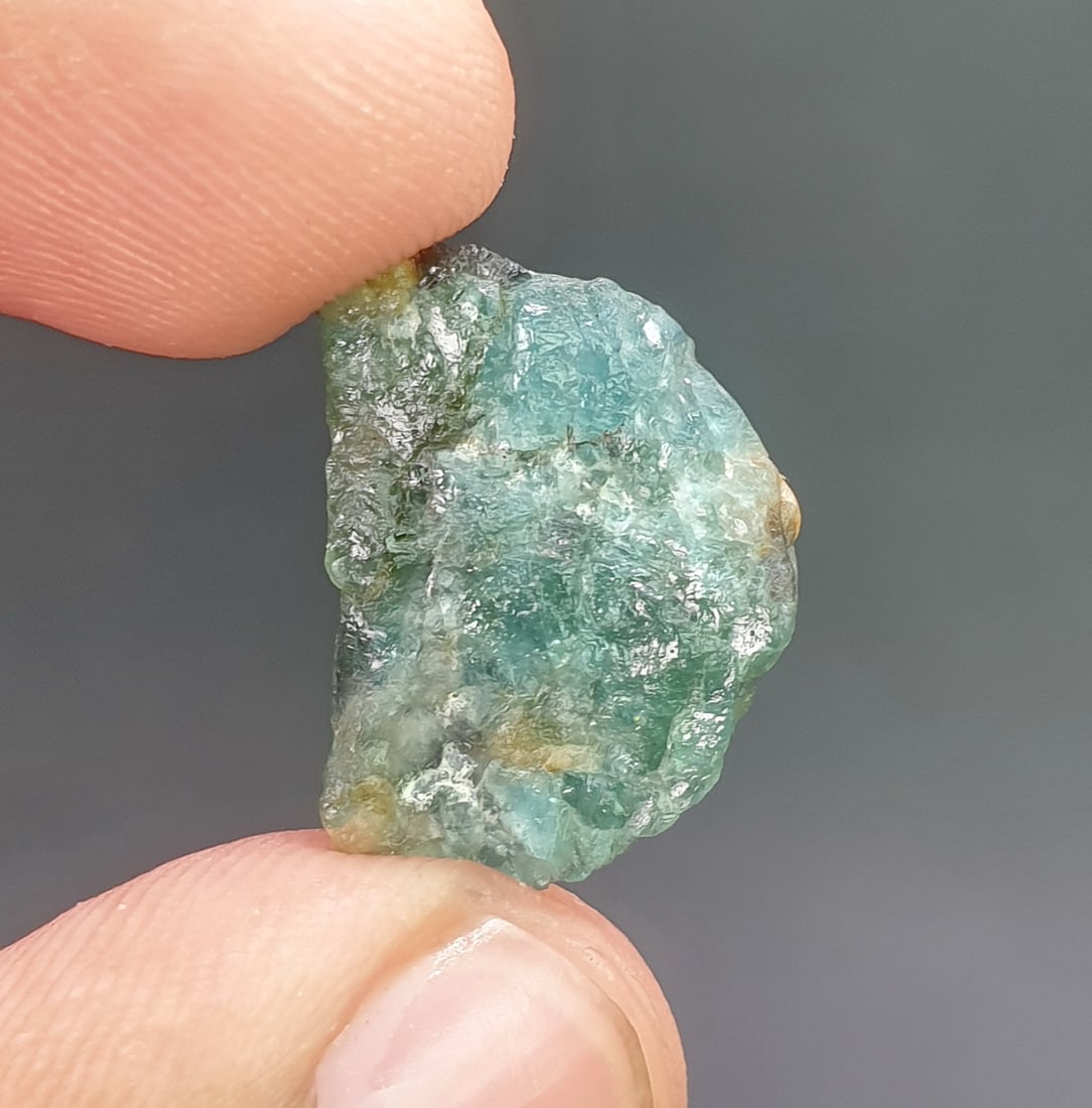 Natural & Unheated~ Blue Grandidierite Rough: Title: Natural & Unheated~ Blue Grandidierite Rough Color/Clarity: Blue Gemstone Type: Rough Carat Weights: 17.95 Cts Size/Dimensions: 17x13x11 mm Reserve: $1.00 Shipping: Domestic: Flat-rate of $35.0