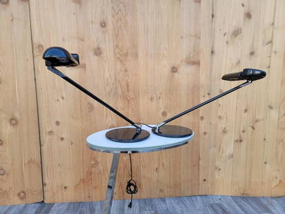 Postmodern Bruno Gecchelin for Arteluce Adjustable Desk Lamp ‘Ring’ - Pair: Vintage from the 1970s Materials: Metal Width: 24 inches Height: 15.5 inches Depth: 8.5 inches Description: Postmodern Bruno Gecchelin for Arteluce Adjustable Desk Lamp ‘Ring’ - Pair Chic postmode