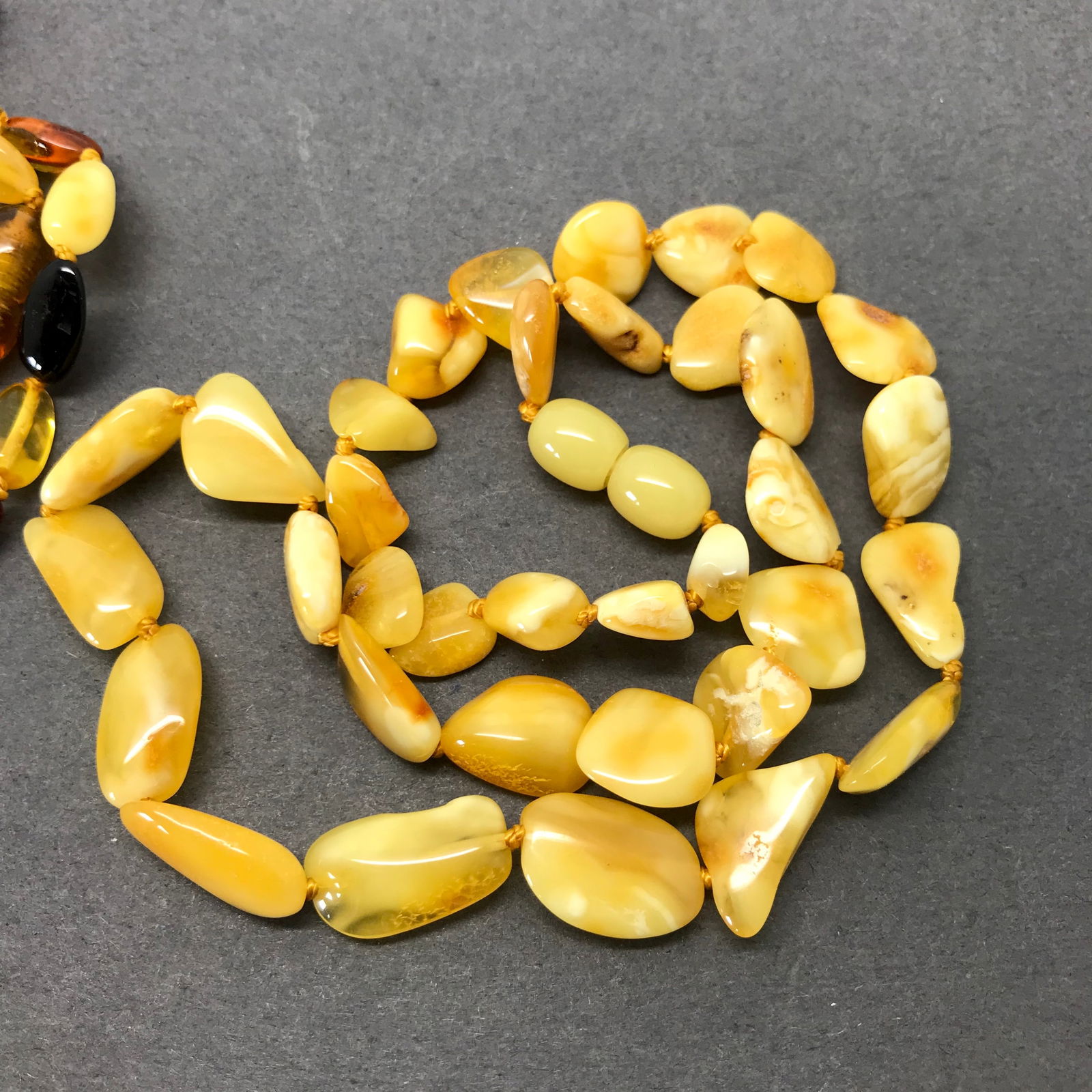 2 necklaces polished Baltic amber stones in various colours (1 of 4)