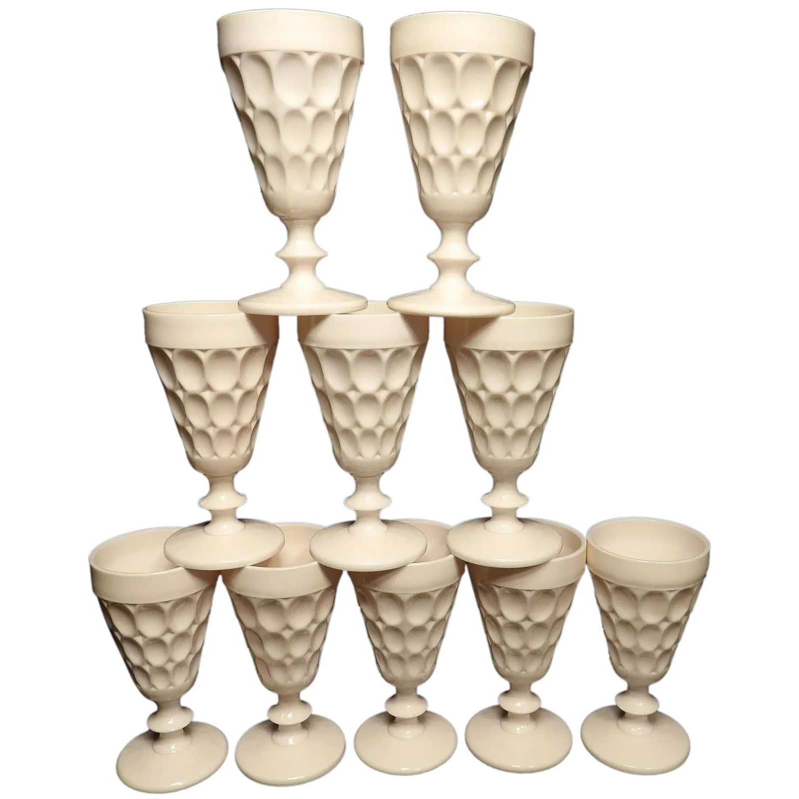 Jeannette Shell Pink Milk Glass Thumbprint Footed Water Goblets: This set of 11 Jeannette Shell Pink Milk Glass Thumbprint Footed Water Goblets are in near MINT condition. NO chips, stains or flea bites. They stand 6 ½” tall and hold 8 oz. These are th