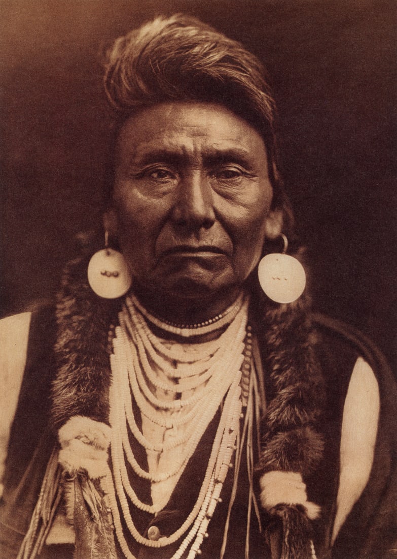 EDWARD CURTIS - Chief Joseph - Nez Perce, 1903: Artist: Edward Curtis Title: Chief Joseph - Nez Perce, 1903 Medium: Photo Litho, 2000, Canada Dimensions: 7.15x10" Description: Heat Wax Mounted on 11x14" Conservation board Artist Bio: Edward Sheriff