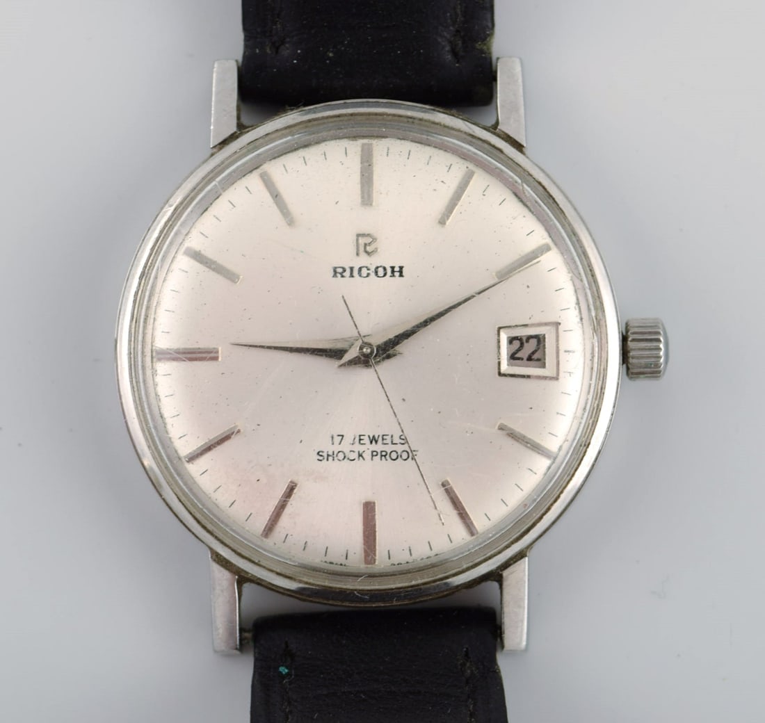 Vintage Ricoh 17 Jewels wristwatch. Japan, 1960s / 70s.: Vintage Ricoh 17 Jewels wristwatch. Japan, 1960s / 70s. Clock diameter: 36 mm. In excellent condition. Stamped. All watches are thoroughly serviced by our professional watchmaker. Reserve: $175.00 Shi