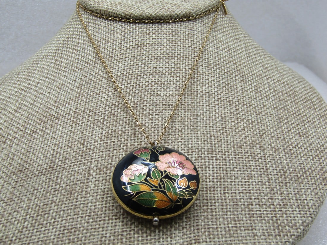 Vintage Monet Guilloche Floral Necklace, 24", 1970's-1980's: Vintage Monet Guilloche Floral Necklace, 24", 1970's-1980's, Puffy round pendant with black enameled backround and peach and pink and green flowers and buds with gold outlines for added detail. Images