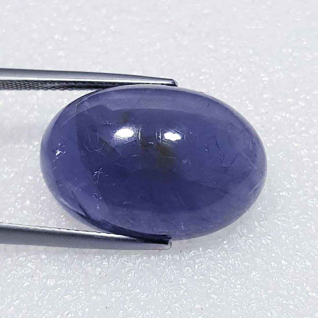 22.94 ctz Fine Collection of NaturalLCabochon Iolite: No Reserve! Title: 22.94 ctz Fine Collection of NaturalLCabochon Iolite Color/Clarity: Blue / VS Gemstone: Sapphire Carat Weights: 22.94 Size: 22.70 x 15.50 x 9.00 Additional Information: Oval Cabocho