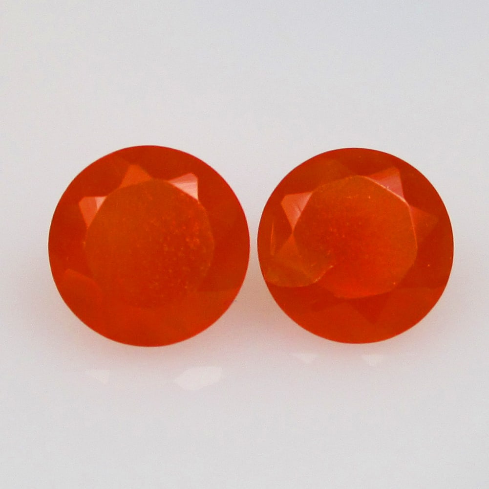 2.29 Ctw Natural Orange Carnelian Round Pair: No Reserve! Title: 2.29 Ctw Natural Orange Carnelian Round Pair Stone Clarity: Semi-Transparent Gemstones: Natural Carnelian Carat Weights: 2.29 Size/Dimensions: 7.20 x 7.20 x 4.50 mm / 2 Pc's Additio