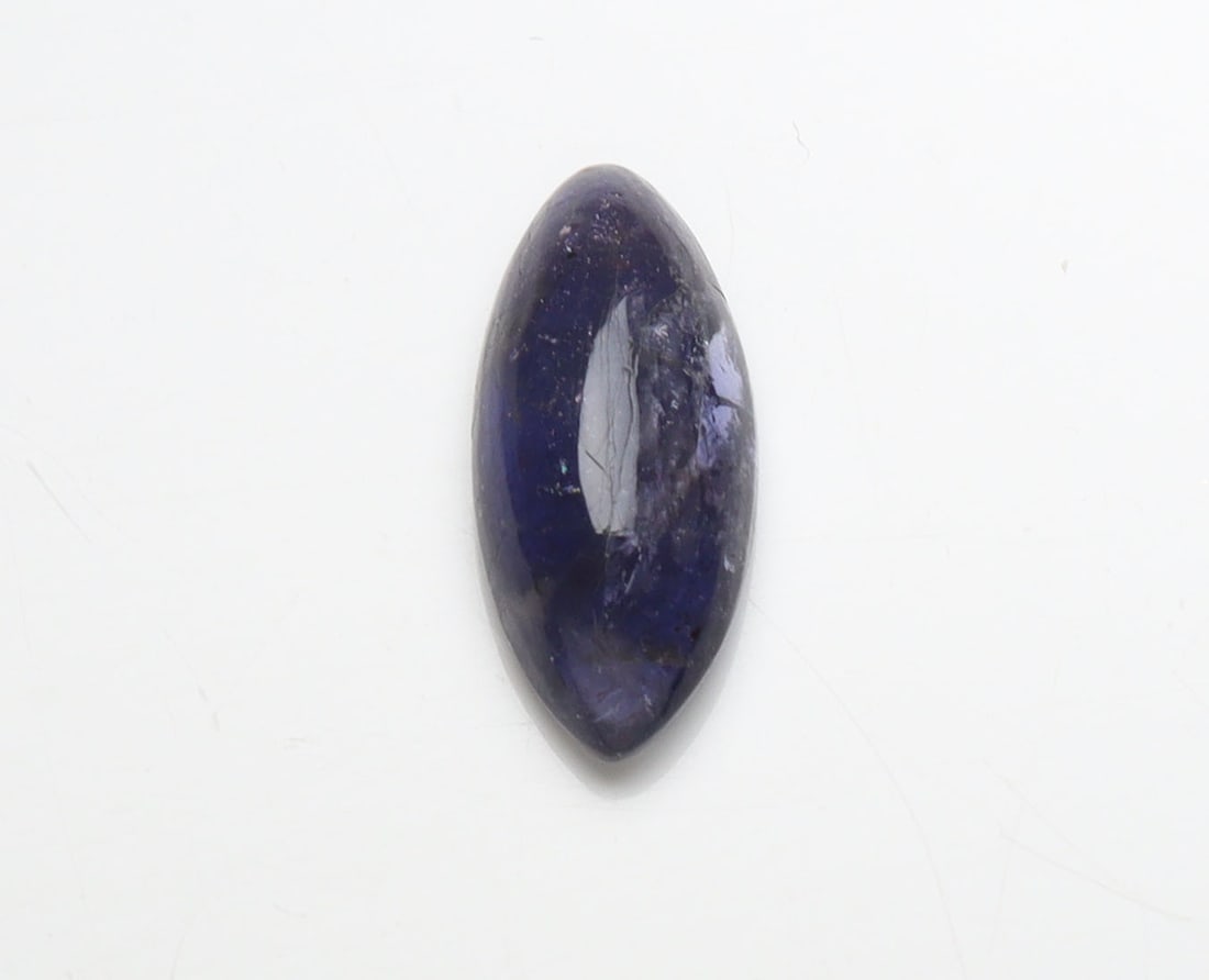Lovely " Natural Iolite Violet " 1.87 Cts Natural Iolite: No Reserve! Title: Lovely " Natural Iolite Violet " 1.87 Cts Natural Iolite Additional Information: Gemstone : Natural Iolite Shape and Cut : Marquies Cabochon Weight : 1.87 Carats Measurements : 13.4