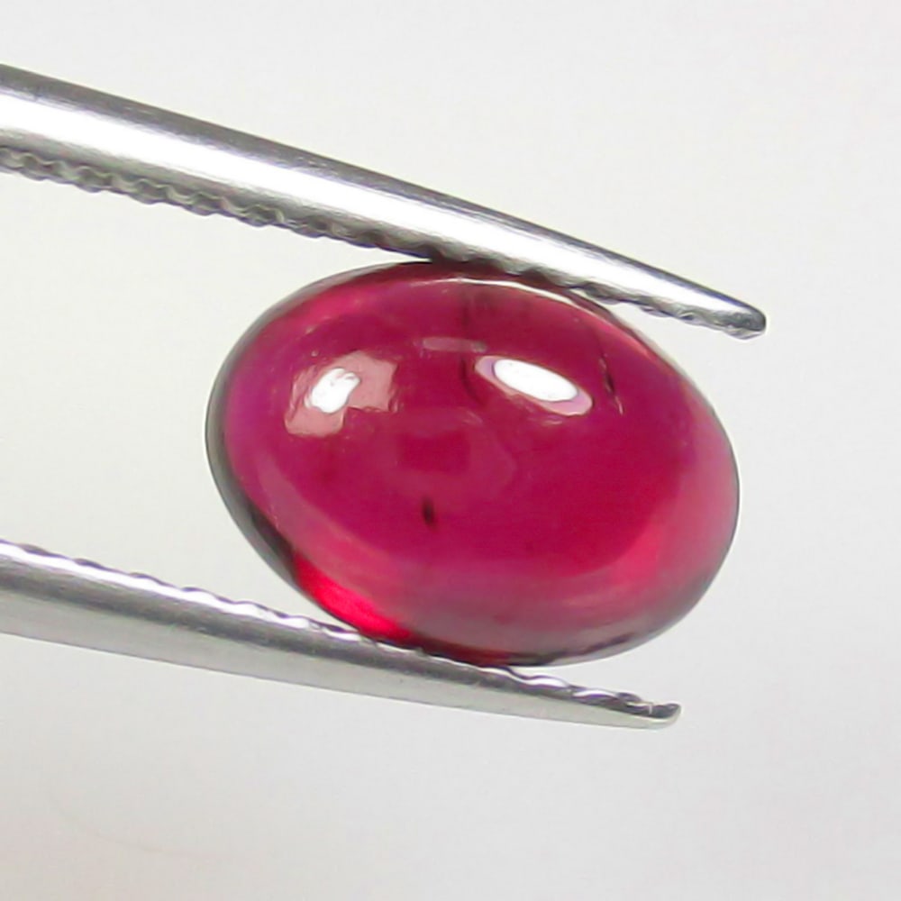 2.02 Ctw Natural Rhodolite Garnet Oval Cab: No Reserve! Title: 2.02 Ctw Natural Rhodolite Garnet Oval Cab Stone Clarity: Transparent Gemstones: Natural Rhodolite Garnet Carat Weights: 2.02 Size/Dimensions: 8.30 x 6.00 x 3.40 mm Additional Infor