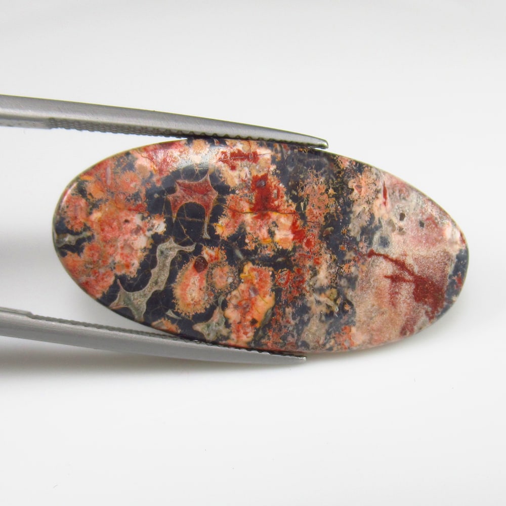 12.52 Ct - Natural Obsidian: No Reserve! Title: 12.52 Ct - Natural Obsidian Additional Information: Gemstone Gemstones: Obsidian Carat Weights: 12.52 Size/Dimensions: 32.0 x 16.0 x 3.3 mm Additional Information: Pieces : 1 No's /