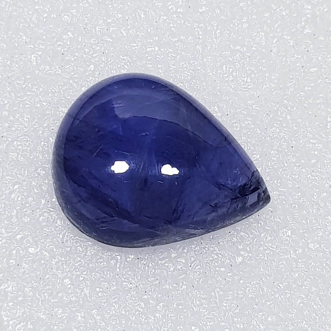 19.23 ctz Fine Collection of NaturalLCabochon Iolite: No Reserve! Title: 19.23 ctz Fine Collection of NaturalLCabochon Iolite Color/Clarity: Blue / VS Gemstone: Sapphire Carat Weights: 19.23 Size: 21.85 x 17.90 x 7.50 Additional Information: Pear Cabocho