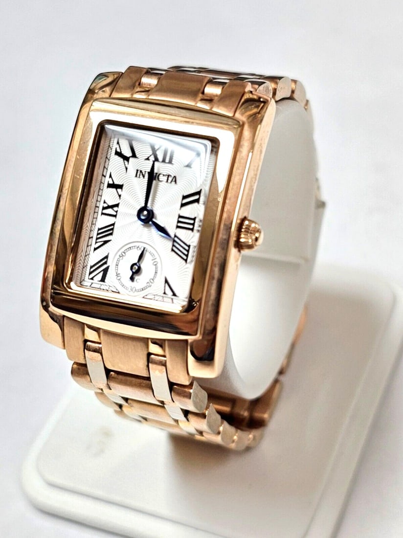 Designer Invicta Angel Model 15625 Golden Tone Ladies Quartz Watch: Title: Designer Invicta Angel Model 15625 Golden Tone Ladies Quartz Watch Additional Information: Designer Invicta Angel Model 15625 Golden Tone Ladies Quartz Watch * Excellent Condition. * New Batter