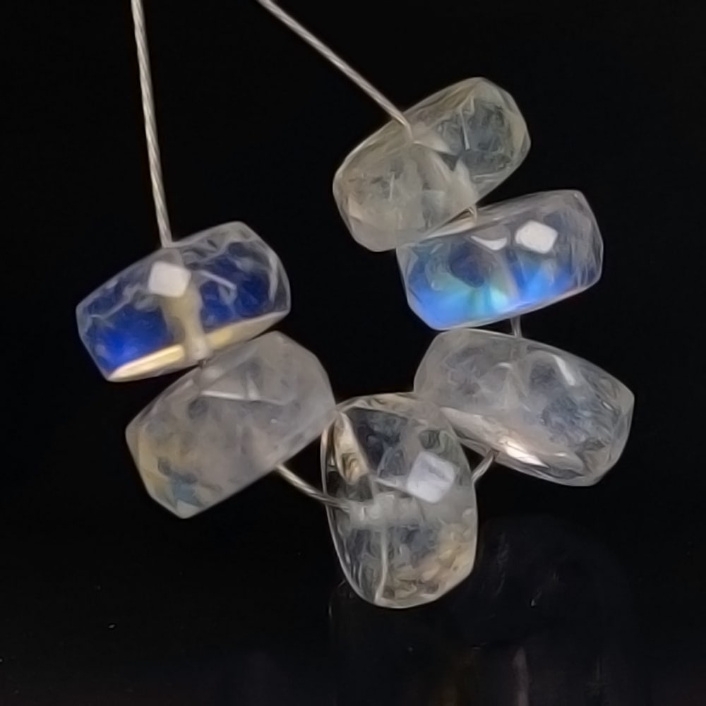 8.18 Ctw Natural 6 Drilled Blue Moonstone Round Beads: No Reserve! Title: 8.18 Ctw Natural 6 Drilled Blue Moonstone Round Beads Stone Clarity: Semi-Transparent Gemstones: Natural Moonstone Beads Carat Weights: 8.18 Size/Dimensions: 6.70 - 6.90 mm / 6 PC's