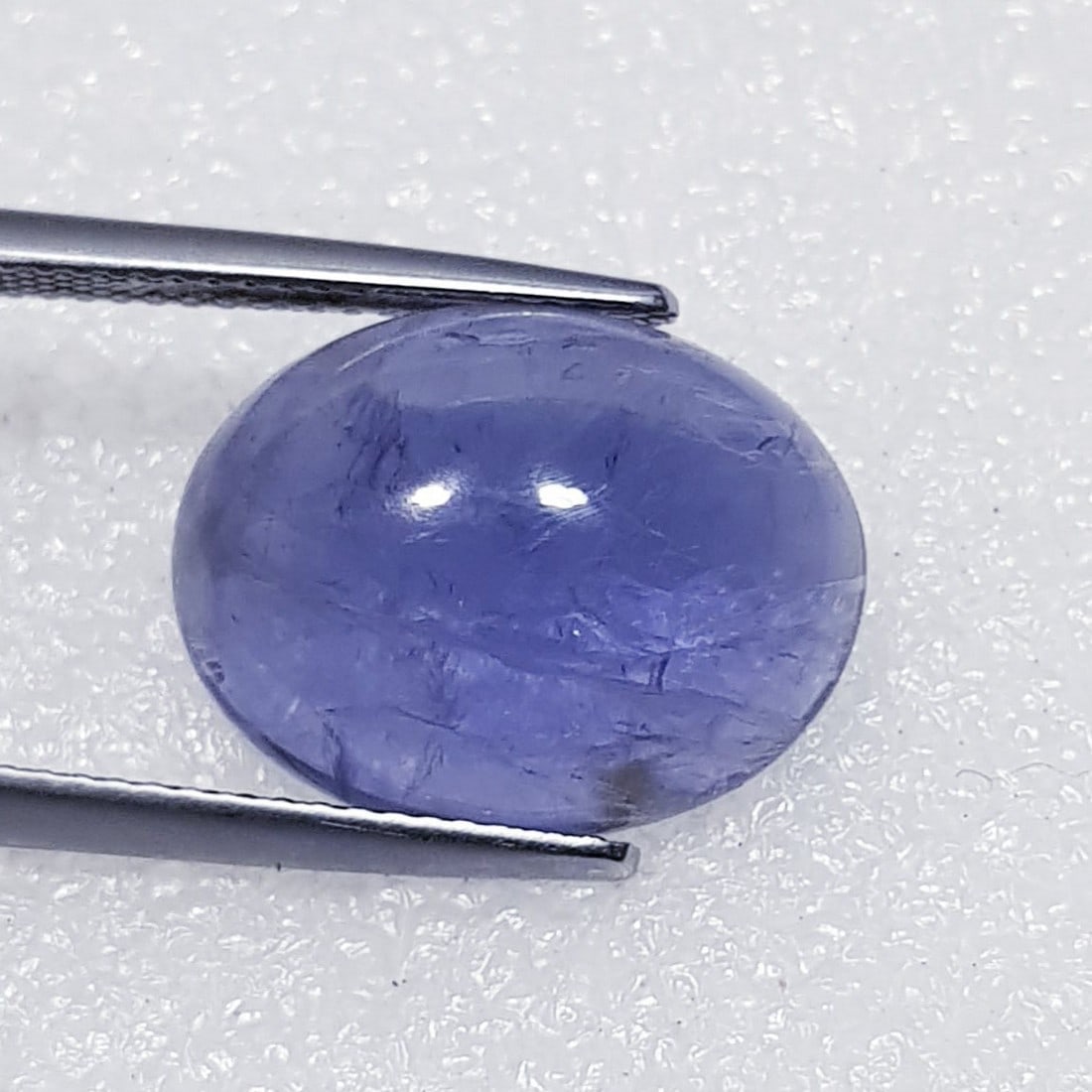 9.13 ctz Fine Collection of NaturalLCabochon Iolite: No Reserve! Title: 9.13 ctz Fine Collection of NaturalLCabochon Iolite Color/Clarity: Blue / VS Gemstone: Sapphire Carat Weights: 9.13 Size: 16.60 x 12.90 x 6.10 Additional Information: Oval Cabochon