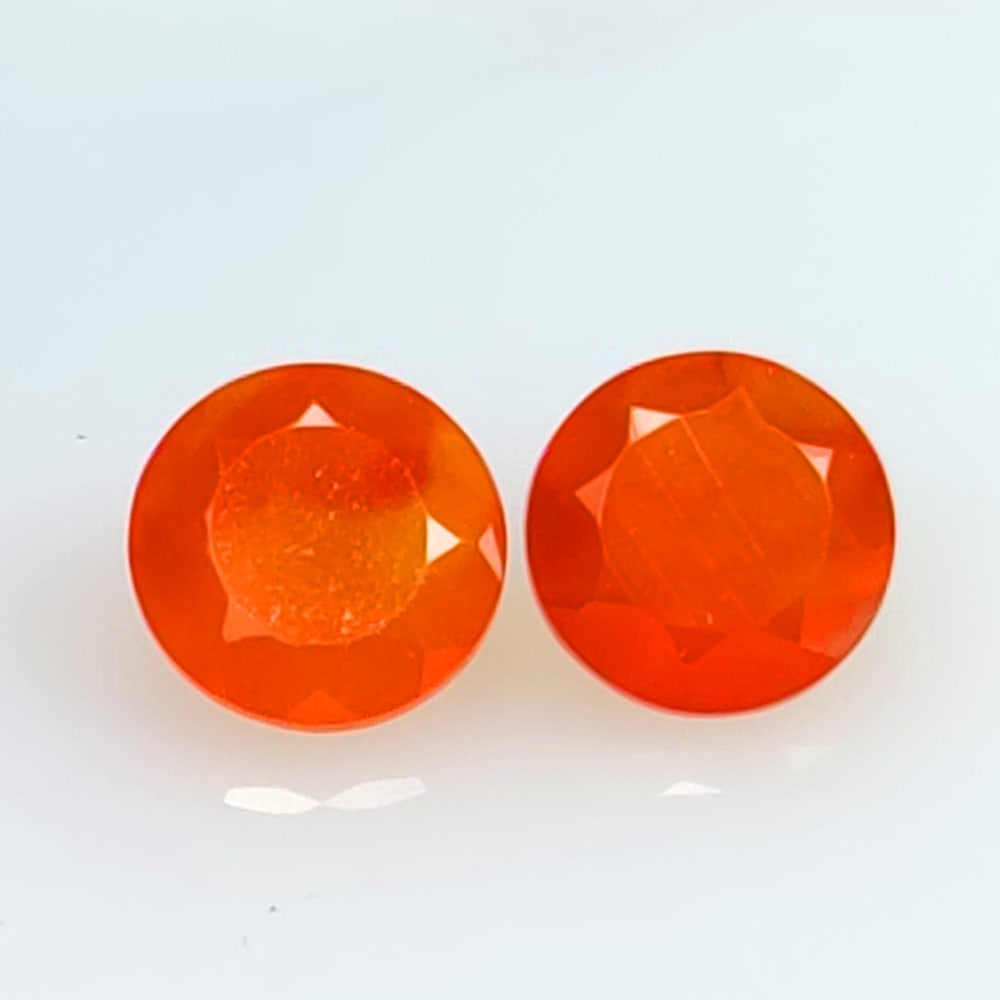 2.14 Ctw Natural Orange Carnelian Round Pair: No Reserve! Title: 2.14 Ctw Natural Orange Carnelian Round Pair Stone Clarity: Semi-Transparent Gemstones: Natural Carnelian Carat Weights: 2.14 Size/Dimensions: 6.90 x 6.90 x 4.10 mm / 2 Pc's Additio