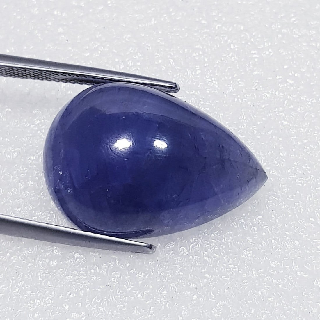 22.63 ctz Fine Collection of NaturalLCabochon Iolite: No Reserve! Title: 22.63 ctz Fine Collection of NaturalLCabochon Iolite Color/Clarity: Blue / VS Gemstone: Sapphire Carat Weights: 22.63 Size: 23.60 x 16.40 x 8.70 Additional Information: Pear Cabocho