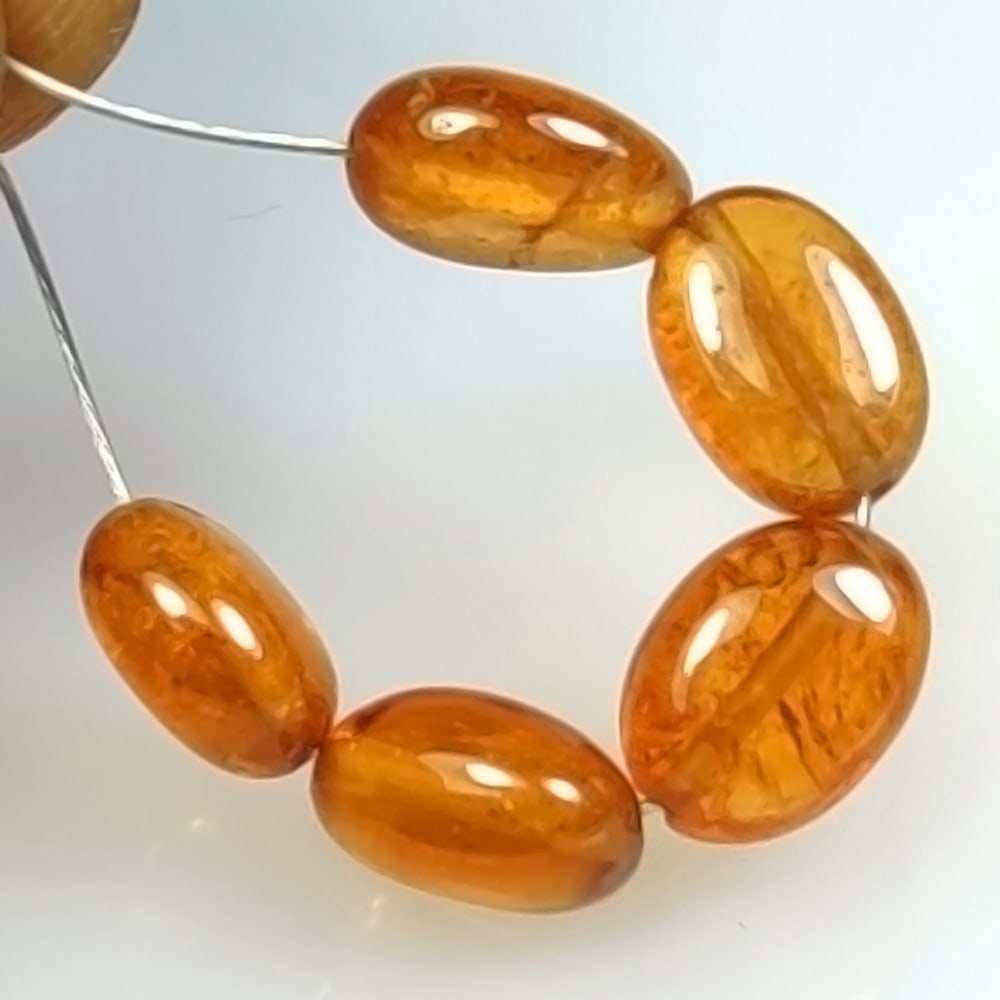 6.85 Ctw Natural 5 Hessonite Garnet Dumble Beads: No Reserve! Title: 6.85 Ctw Natural 5 Hessonite Garnet Dumble Beads Stone Clarity: Transparent Gemstones: Natural Hessonite Garnet Beads Carat Weights: 6.85 Size/Dimensions: 5.1x3.8- 5.5x3.7 mm / 5 Pc