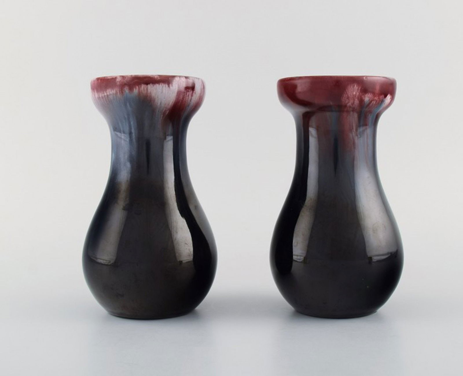 Michael Andersen, Denmark. Two vases in glazed ceramics. Beautiful glaze in red and dark shades.: Title: Michael Andersen, Denmark. Two vases in glazed ceramics. Beautiful glaze in red and dark shades. 1950's. Description: Michael Andersen, Denmark. Two vases in glazed ceramics. Beautiful glaze in