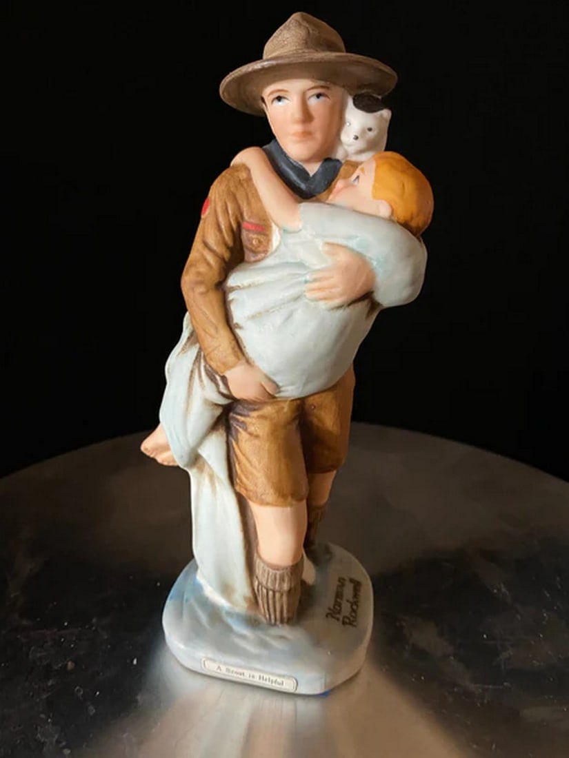 BOY SCOUTS OF AMERICA. "A SCOUT IS HELPFUL." NORMAN ROCKWELL PORCELAIN FIGURINE by EZ Rug & Art: Artist: Norman RockwellDesigner: Dave GrossmanTitle: Medium: ceramicDate: 1981Style: traditionalMade in Japan. Good condition. All vintage decorations are sold as is. Reserve: $15.00 Shipping: Domesti