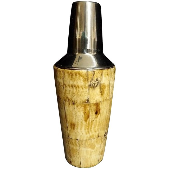 Stainless Steel Cocktail Shaker with Mosaic of Bone in Antique Finish: DescriptionThis Stainless Steel Cocktail Shaker with Mosaic of Bone in Antique Finish is in excellent condition. Looks as if it was never used- MINT condition. Lid fits very tight so it does not leak.