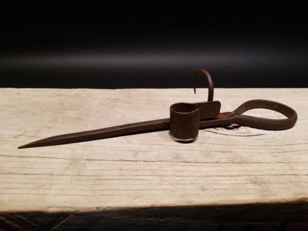 Wrought Iron Mining Sticking Tommy Miners Candlestick: 10 1/2" Long Nice Reproduction iron miners candle holder. Great handmade distressed to look like an antique.... Miner spikes like this were used in the mining trade & era. The spike would be hammered 