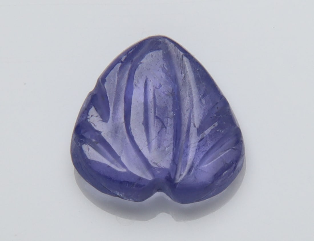Beautiful " Natural Tanzanite Carving " 2.01 Cts Natural Tanzanite Carving: No Reserve! Title: Beautiful " Natural Tanzanite Carving " 2.01 Cts Natural Tanzanite Carving Additional Information: Gemstone : Natural Tanzanite Origin: Tanzania Weight : 2.01 carats Dimensions : 8.