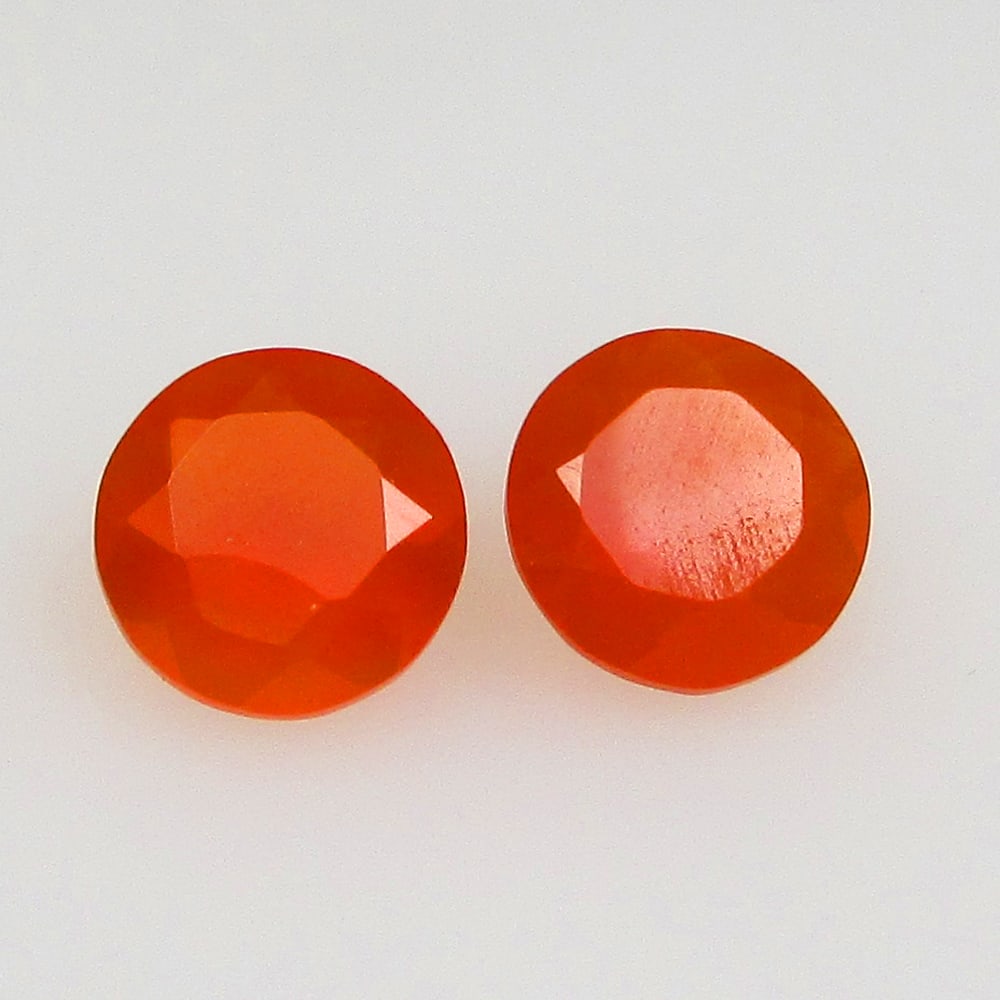 2.32 Ctw Natural Orange Carnelian Round Pair: No Reserve! Title: 2.32 Ctw Natural Orange Carnelian Round Pair Stone Clarity: Semi-Transparent Gemstones: Natural Carnelian Carat Weights: 2.32 Size/Dimensions: 7.30 x 7.30 x 4.10 mm / 2 Pc's Additio