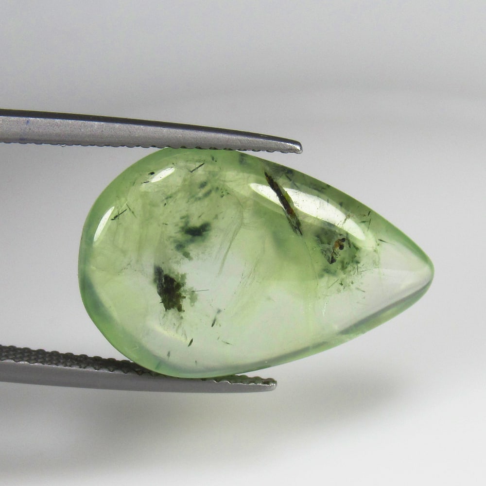 11.73 Ct - Natural Prehnite Jasper: No Reserve! Title: 11.73 Ct - Natural Prehnite Jasper Gemstone Gemstones: Prehnite Carat Weights: 11.73 Size/Dimensions: 22.0 x 14.0 x 4.7 mm Additional Information: Pieces : 1 No's / Shape : Pear Cab