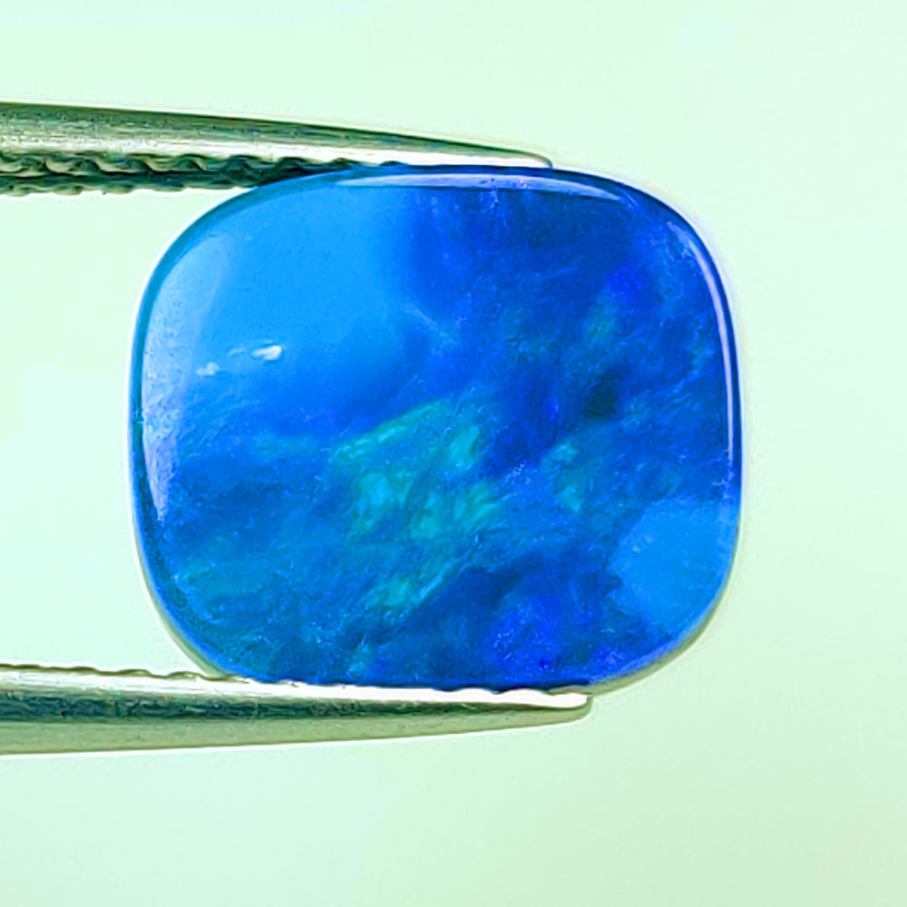 3.14 Ctw Natural Australian Doublet Opal Cushion Cabochon: No Reserve! Title: 3.14 Ctw Natural Australian Doublet Opal Cushion Cabochon Stone Clarity: Opaque Gemstones: Natural Australian Opal Carat Weights: 3.14 Size/Dimensions: 9.90 x 8.80 x 3.40 mm Additio