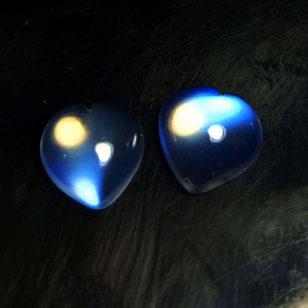 1.30 Ctw Natural Blue Moonstone Heart Pair: No Reserve! Title: 1.30 Ctw Natural Blue Moonstone Heart Pair Stone Clarity: Translucent Gemstones: Natural Moonstone Carat Weights: 1.30 Size/Dimensions: 6.10 x 6.00 x 3.00 mm / 2 Pc's Additional Inf