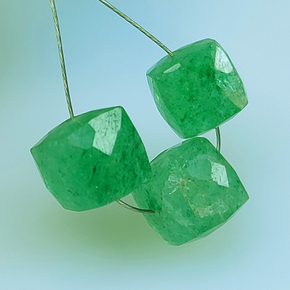 10.79 Ctw Natural 3 Beryl Square Beads: No Reserve! Title: 10.79 Ctw Natural 3 Beryl Square Beads Stone Clarity: Transparent Gemstones: Natural Beryl Beads Carat Weights: 10.79 Size/Dimensions: 7.0x7.0 - 7.5x7.5 mm / 3 Pc's Additional Infor