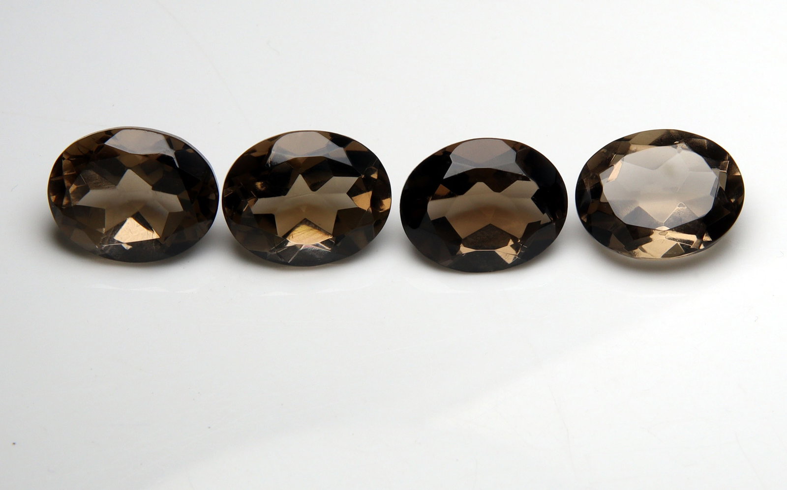 Delightful " Natural Smoky Quartz " 10.00 Cts Natural Smoky Quartz Pair: No Reserve! Title: Delightful " Natural Smoky Quartz " 10.00 Cts Natural Smoky Quartz Pair Additional Information: Gemstone : Natural Smoky Quartz Shape and cut : Oval Cut Origin : Africa Weight : 10.
