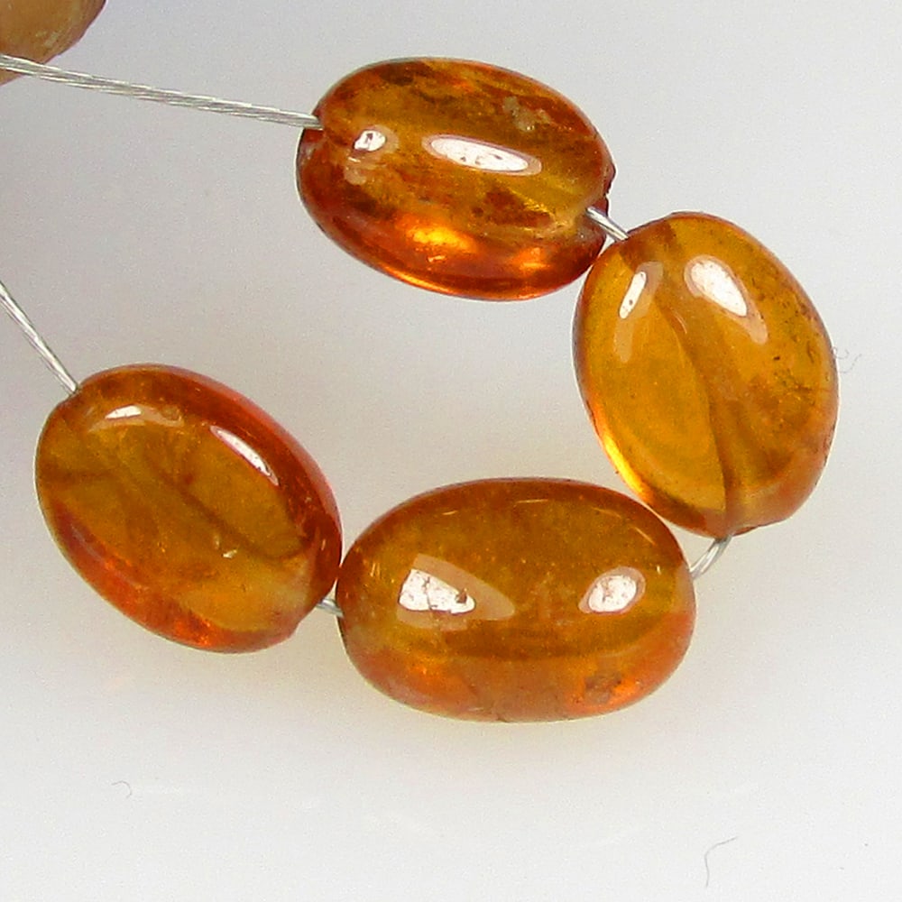 6.35 Ctw Natural 4 Hessonite Garnet Dumble Beads: No Reserve! Title: 6.35 Ctw Natural 4 Hessonite Garnet Dumble Beads Stone Clarity: Transparent Gemstones: Natural Hessonite Garnet Beads Carat Weights: 6.35 Size/Dimensions: 5.2x3.2- 5.7x3.5 mm / 4 Pc