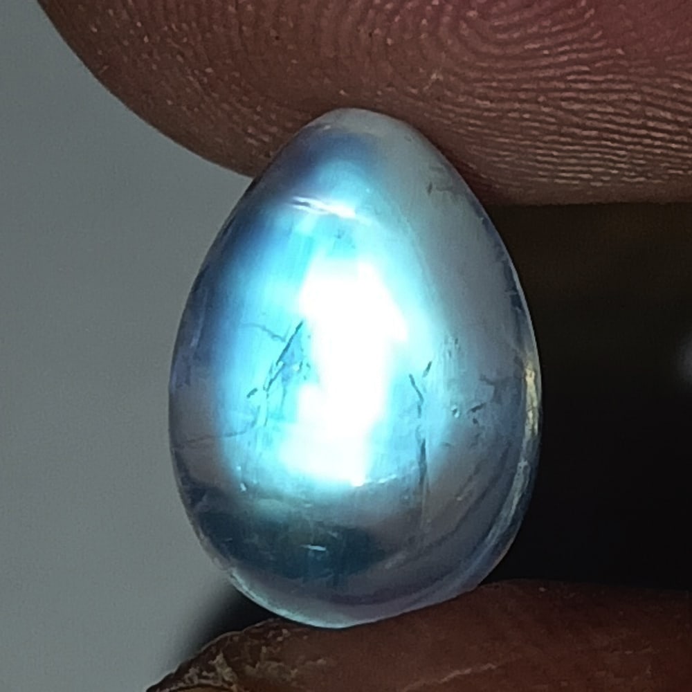 3.20 Ctw Natural Blue Moonstone Pear Cab: No Reserve! Title: 3.20 Ctw Natural Blue Moonstone Pear Cab Stone Clarity: Transparent Gemstones: Natural Moonstone Carat Weights: 3.2 Size/Dimensions: 12.00 x 8.40 x 4.80 mm Additional Information: P