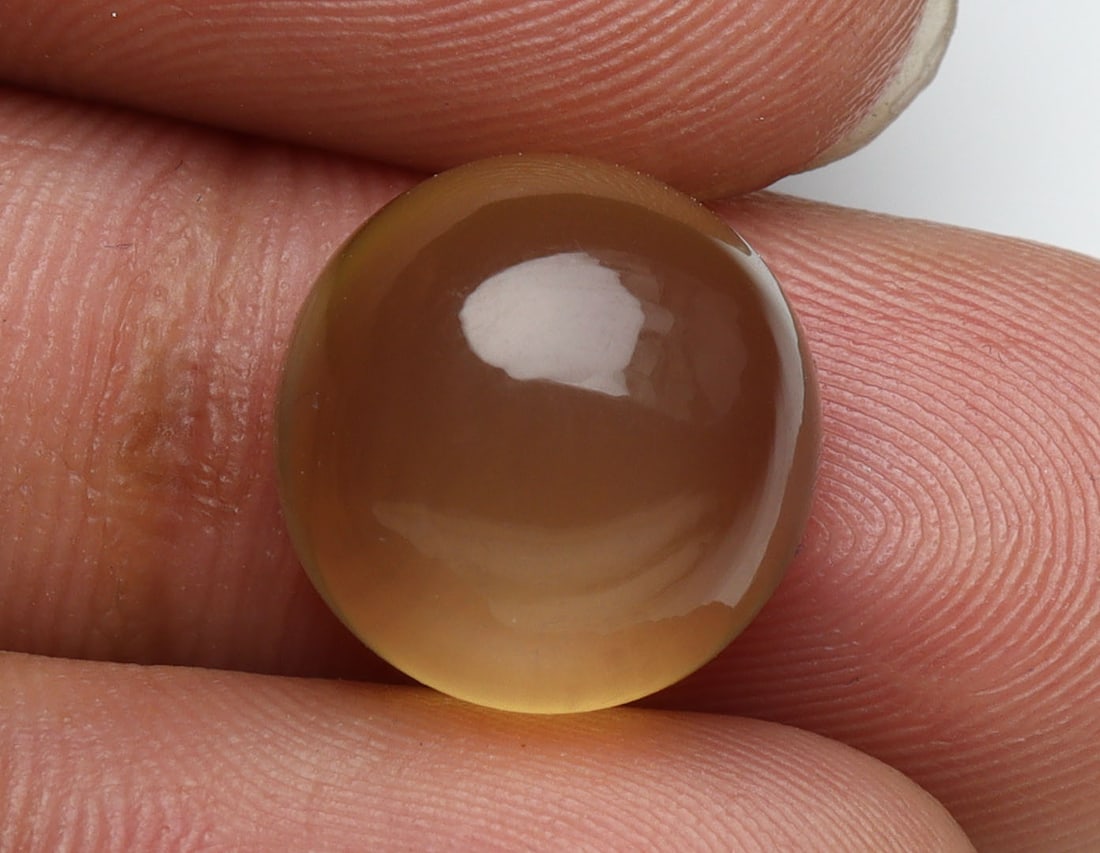 Spectacular " Natural Moonstone " 9.96 Cts Natural Moonstone: No Reserve! Title: Spectacular " Natural Moonstone " 9.96 Cts Natural Moonstone Additional Information: Gemstone : Natural Moonstone Shape : Round Cabochan Weight : 9.96 carats Measurements : 13x13 mm