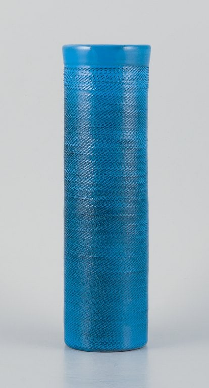 Ingrid Atterberg for Upsala-Ekeby, large "Bris" (breeze) ceramic vase in light blue glaze.: Ingrid Atterberg for Upsala-Ekeby, large "Bris" (breeze) ceramic vase in light blue glaze. Approximately from the 1960s. Marked In excellent condition. Dimensions: H 26.5 cm x D 7.5 cm. Reserve: $350.