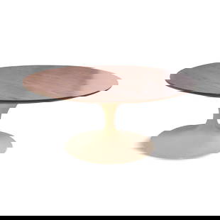 Vintage Tulip Coffee Table by Eero Saarinen for Knoll: A vintage coffee table by Eero Saarinen for Knoll with white tulip base and laminate top. This icon of mid-century modern design was acquired from the family of the original owner, who purchased it in