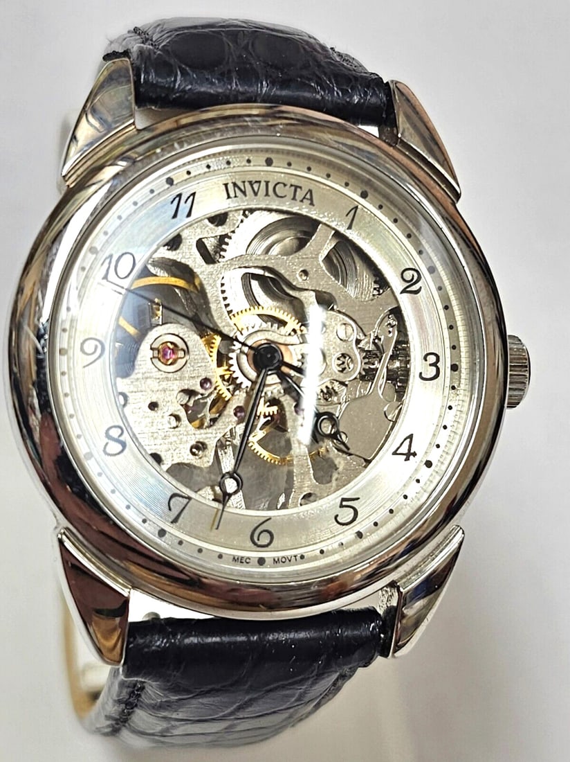 Designer Invicta Skeleton 17 Jewels Unisex Automatic Watch 38mm Diameter: Title: Designer Invicta Skeleton 17 Jewels Unisex Automatic Watch 38mm Diameter Additional Information: Designer Invicta Skeleton 17 Jewels Unisex Automatic Watch 38mm Diameter **Very good Condition**