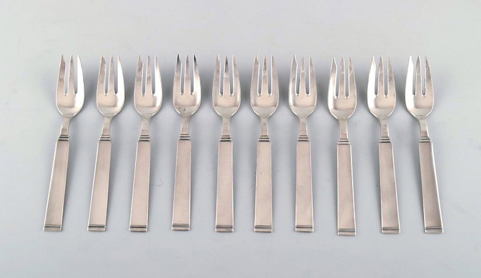 Horsens Denmark: "Funkis III". Pastry fork. 10 pcs. in stock.: Horsens Denmark: "Funkis III". 10 pcs. pastry fork. Art deco silver cutlery. 1930/40 s. Measures 14.5 cm. Stamped. In very good condition. Reserve: $35.00 Shipping: Domestic: Shipping rates are determ