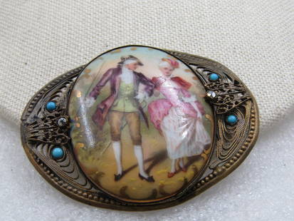 Antique Czech-Slovak Signed Courting Scene Brooch, Filigree, Turquoise Stones, Early 1900's: Antique Czech-Slovak Signed Courting Scene Brooch, Filigree, Turquoise Stones, Early 1900's. Large oval courting scene with gold leaf accents and bezel-set in the center. It is appx. 1-7/8" tall and 1
