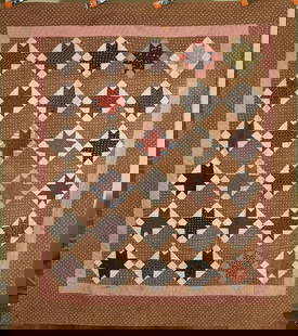 1870's Ohio Stars Quilt: This ELEGANT cotton 1870's Ohio stars quilt is all hand pieced and hand quilted, with a variety of early brown fabrics. It measures 66" X 78" and is in excellent condition, with the occasional age spo