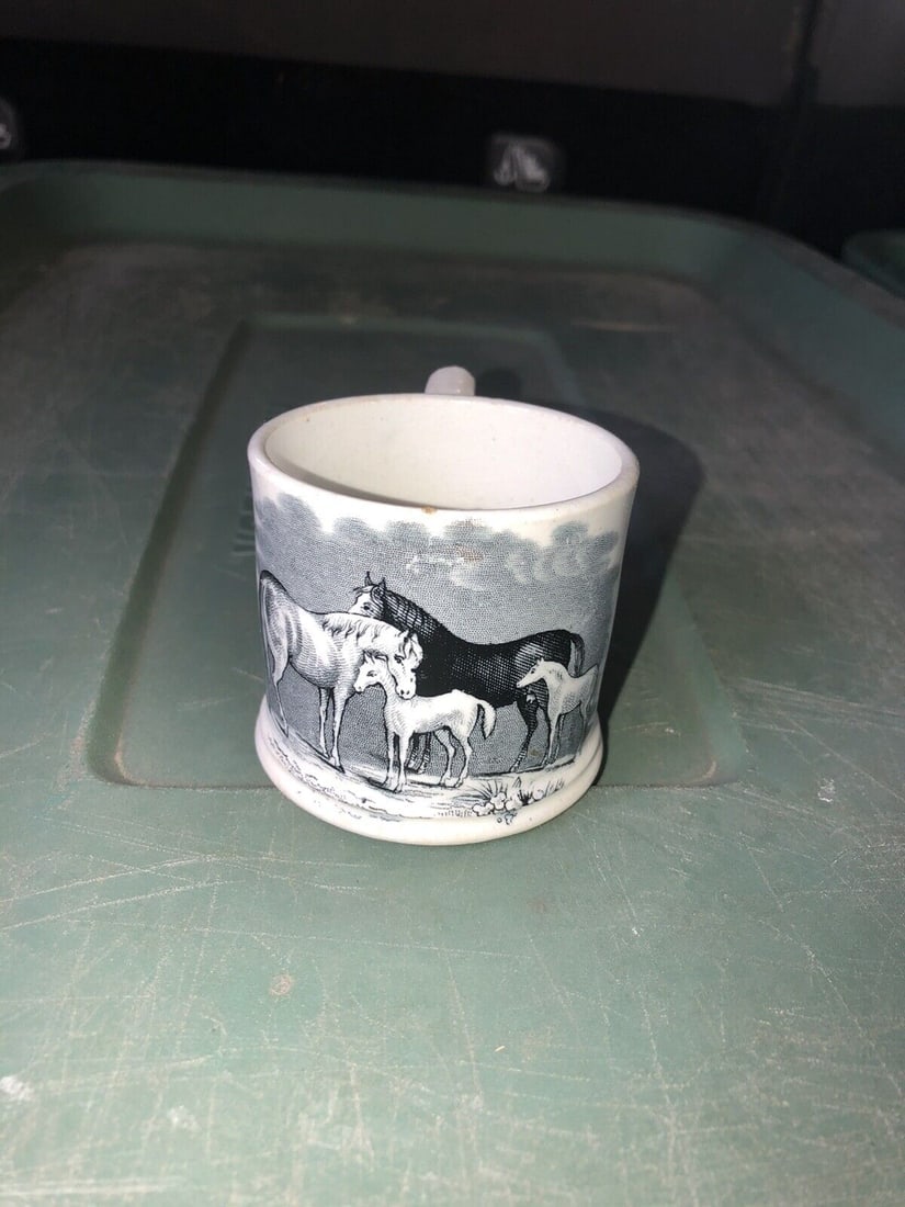 staffordshire mug w/ horses: It measures 2 1/4” x 3 1/4” and dates around the 1930’s. The top rim has a tiny glaze flaw. Otherwise it has no other issues Shipping: Domestic: Flat-rate of $15.00 to anywhere withi