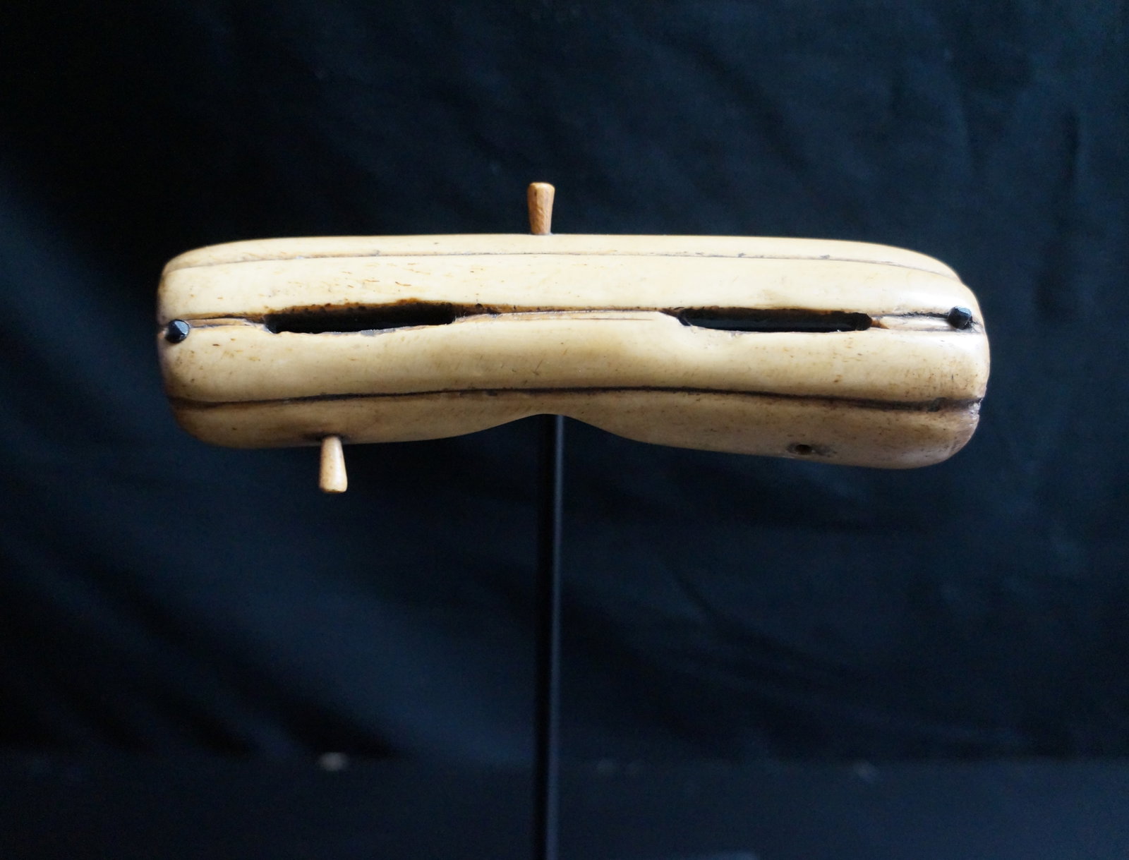 Siberian Native INUIT Goggles: Title: Siberian Native INUIT Goggles Date/Period: 1960/70 Origin: Chukotka, Russia Dimension: 5.7 inches large - Materials: walrus tusk. Additional Information: Finely carved Chukotka Eskimo snow gogg