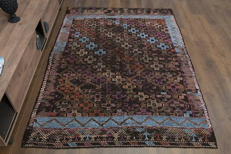 1970s Kilim Oushak Handmade Wool Colorful Area Rug: Title: 1970s Kilim Oushak Handmade Wool Colorful Area RugOrigin: TurkeyDate/Period: 1960 - 1970Materials: Wool and CottonSize: Width: 5.6 feet Length: 7.6 feetDescription: This Turkish one-of-a-kind