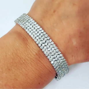 14.09ct T.W. Diamond Multi Row Tennis Bracelet in 14k White Gold 7": Title: 14.09ct T.W. Diamond Multi Row Tennis Bracelet in 14k White Gold 7" Additional Information: Description 14.09ct T.W. Diamond Multi Row Tennis Bracelet in 14k White Gold 7". Comes in a free gift