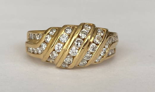 Chaumet Paris Vintage Yellow gold Diamond Ring: Offered Beautiful vintage ring in 18k yellow gold and diamonds made in Paris France by the Chaumet jewelry house. The ring is set with 38 round brilliant cut diamonds, approximately 0.90 carat of F/VS